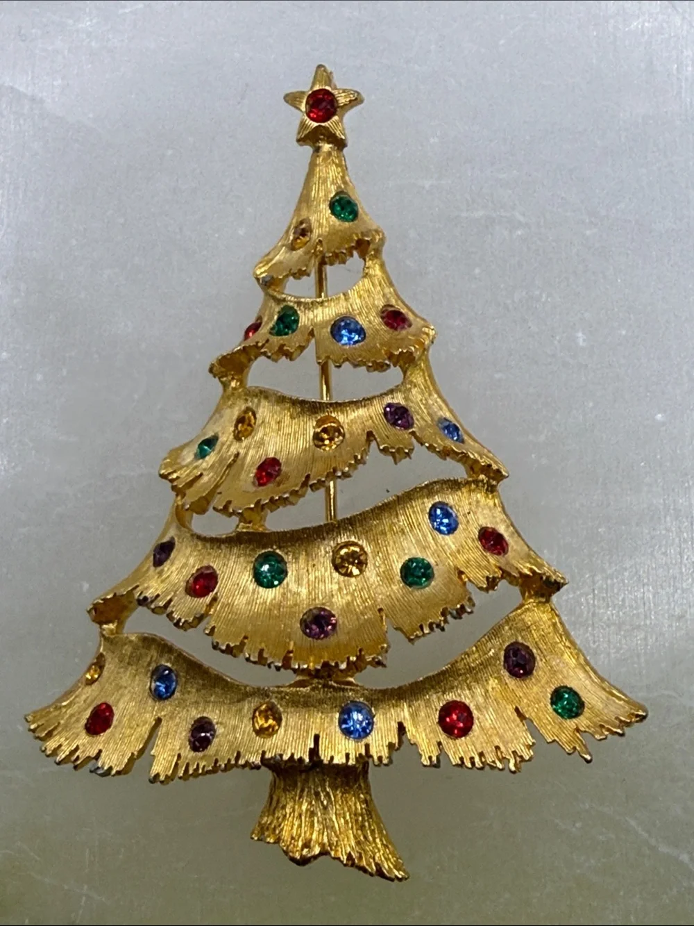 Vintage JJ Gold-tone Christmas Tree Pin with Multicolored Rhinestones